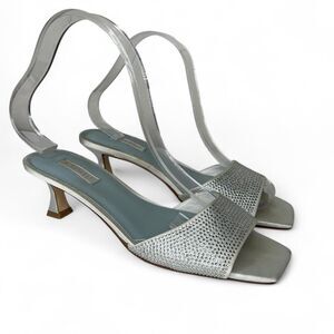 Silver New West heels with rhinestone detailsnin